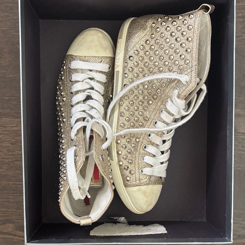 Prada Gold High-Top Sneakers with Studs
